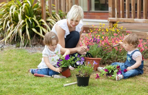 Landscaping team standing together in a professional outdoor setting